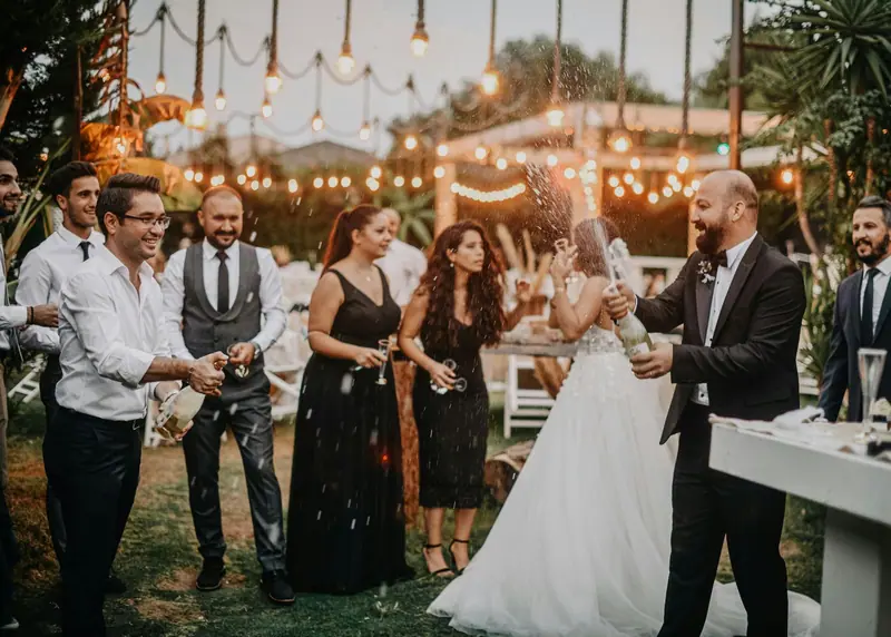 An evening wedding reception under string lights